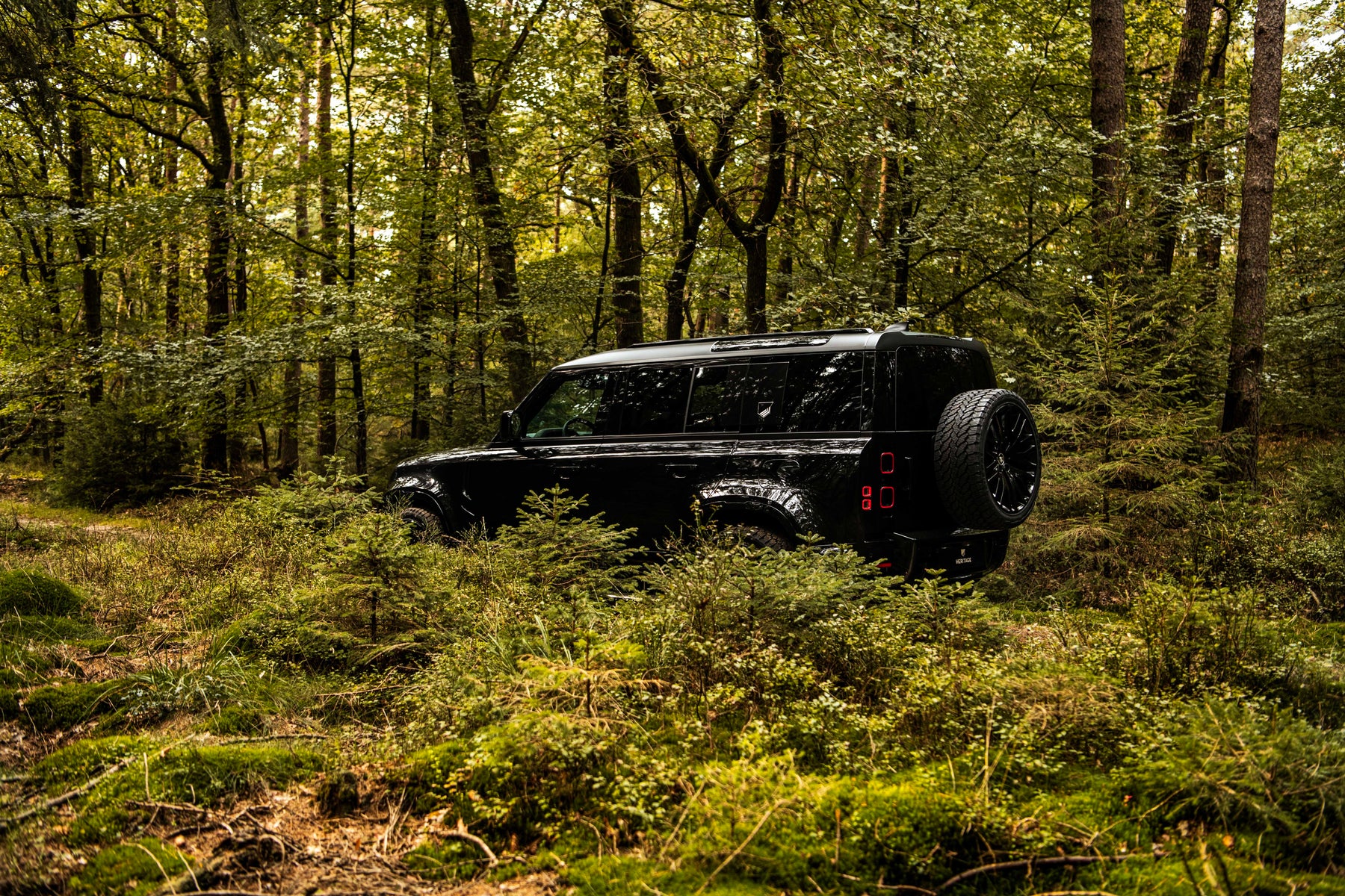 Defender 110 P400e - Santorini black & bronze
