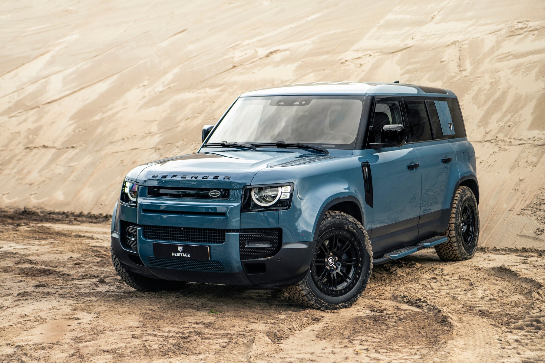 Defender 110 P400e - Tasman blue