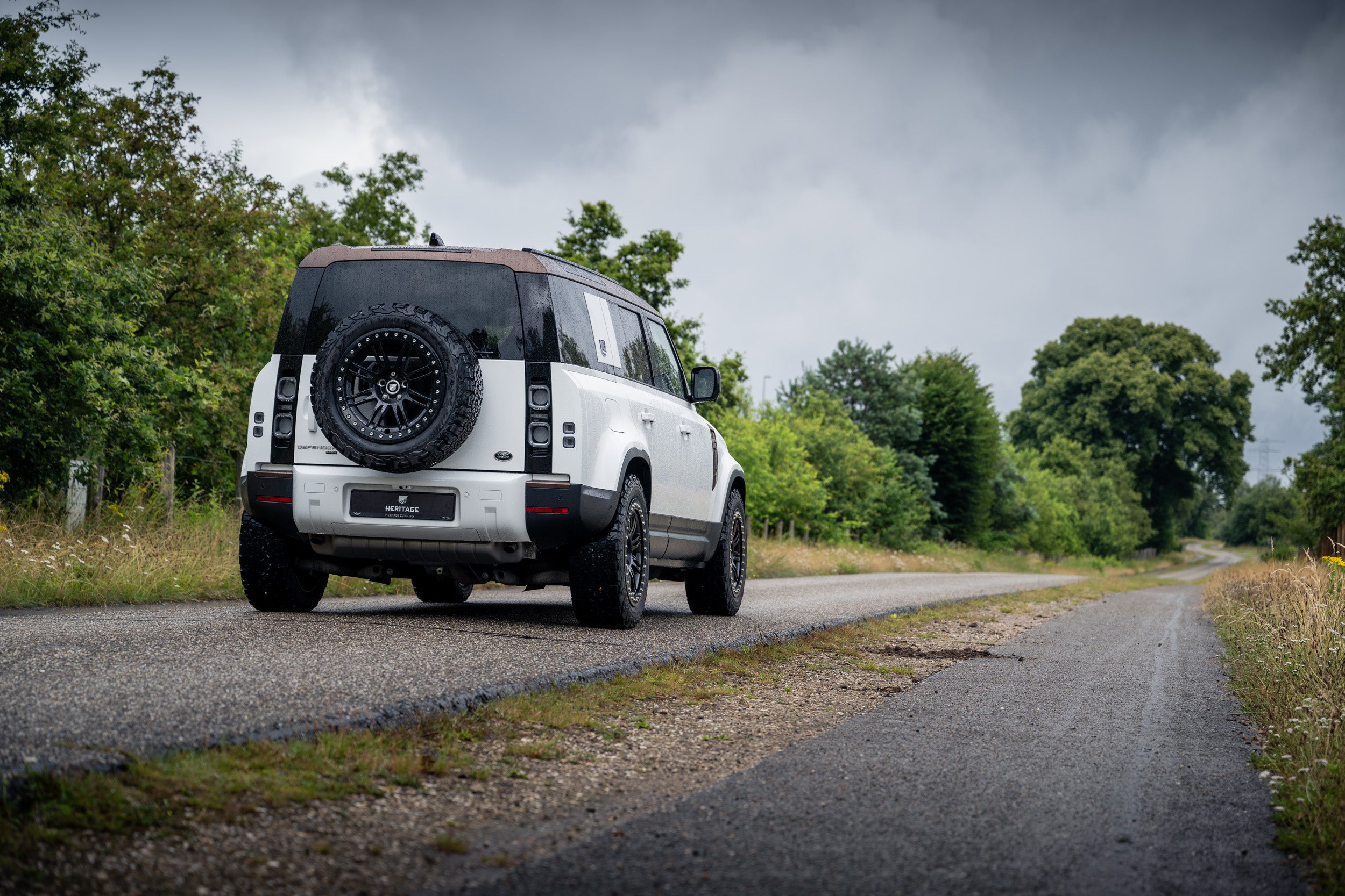 Defender 110 P400e - Fuji white and bronze – Heritage Customs