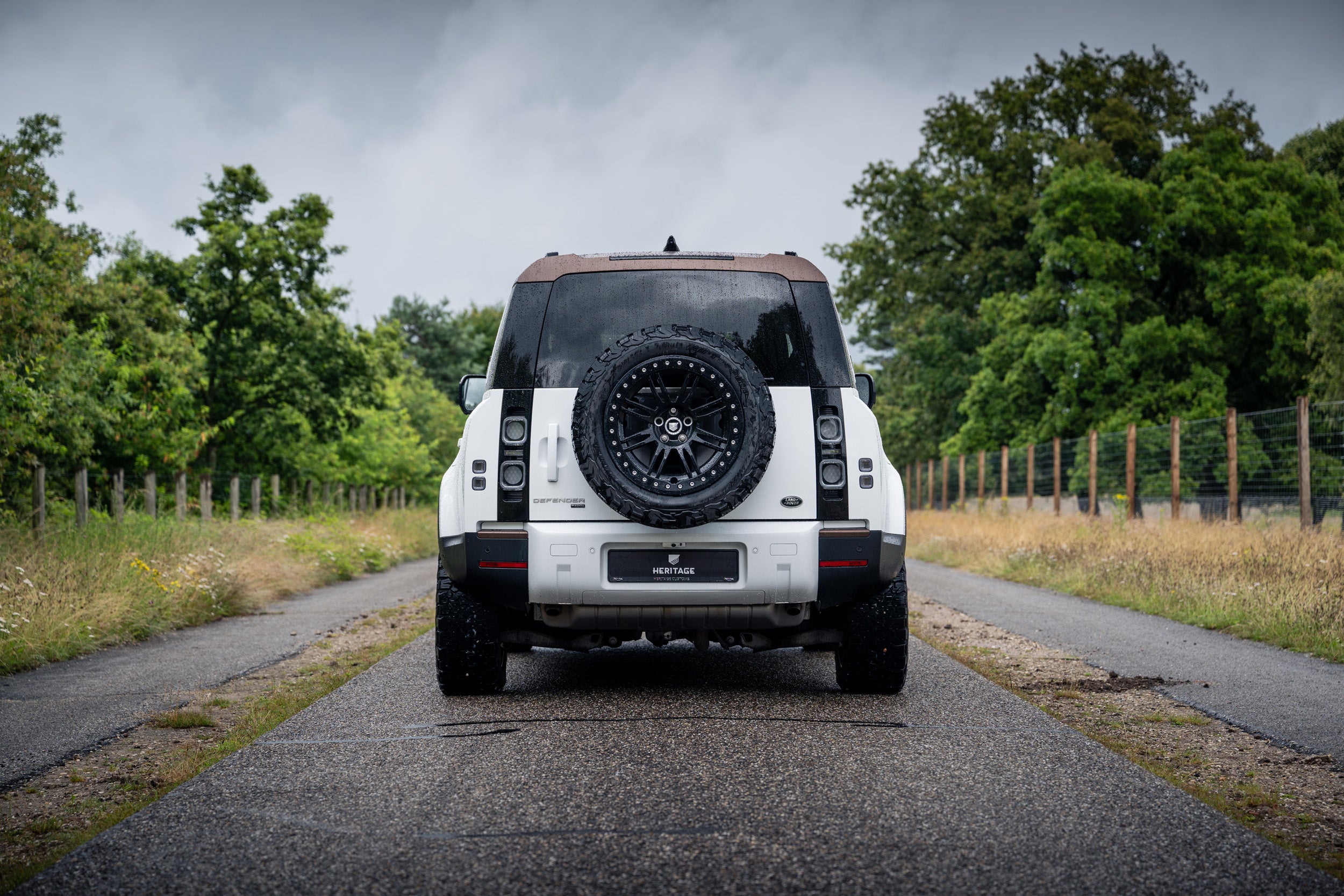 Defender 110 P400e - Fuji white and bronze – Heritage Customs